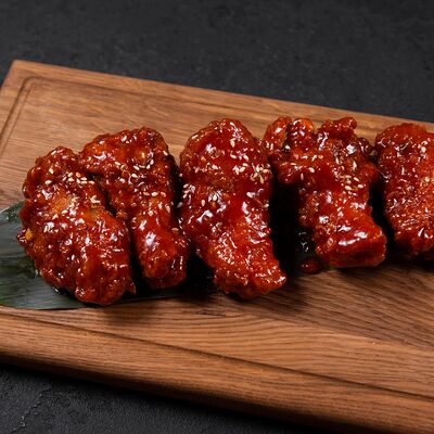 Крылышки в остро-сладком соусе в Soju по цене 1040 ₽