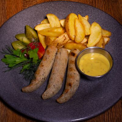 Колбаска куриная с сыром в Кнедлик по цене 595 ₽