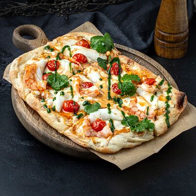 Пицца том ям в Изи Паб по цене 995 ₽