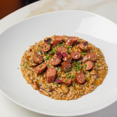 Ризотто с сальсичей в Romano по цене 1500 ₽