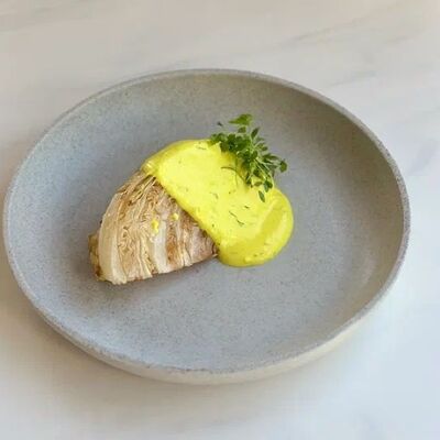 Стейк капусты под пряным сливочным соусом в Prana по цене 420 ₽