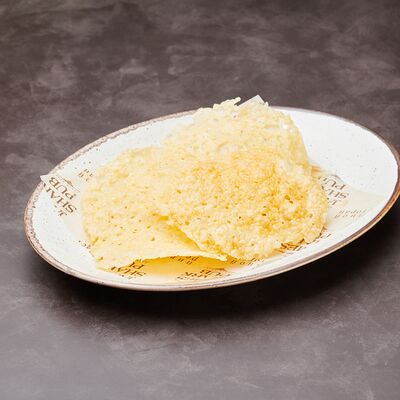 Хрустящие чипсы из пармезана в The James Shark Pub по цене 360 ₽