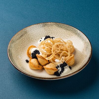 Пельмени с щукой жареные в Мираж по цене 260 ₽