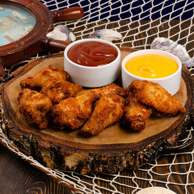 Куриные крылышки 8 шт в Capitan Shaverma по цене 560 ₽