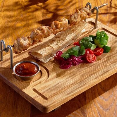 Шашлык из куриного бедра в BBQ Beer Restaurant по цене 830 ₽