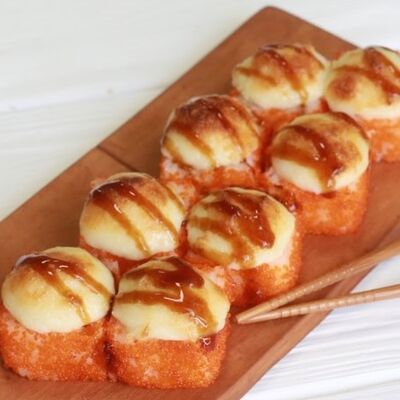 Запеченная Калифорния под сырным соусомв Суши Лавка по цене 479 ₽