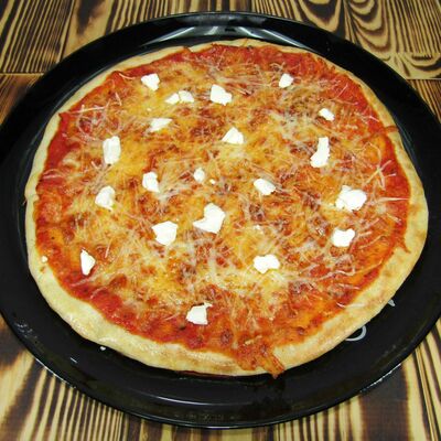 Пицца Четыре сыра в Rioz pizza по цене 340 ₽