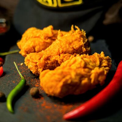 Острые куриные крылья в Крылышки Джо по цене 1847 ₽