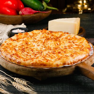 Сырный пирог в Славянский базаръ по цене 900 ₽