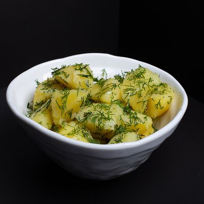 Картофель отварной с зеленью в Рябинушка по цене 180 ₽