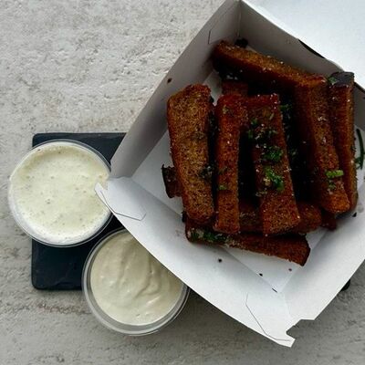 Гренки чесночные в Еду домой по цене 250 ₽