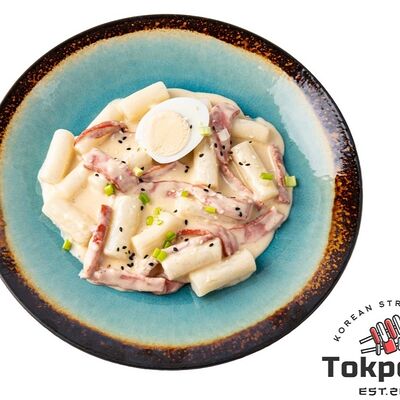 Токпокки с сыром и сосисками в Tokpokki по цене 890 ₽