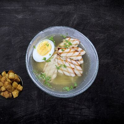 Куриный бульон с яйцом в Шансон по цене 520 ₽