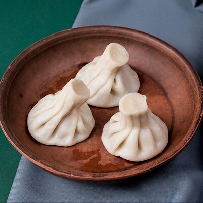 Хинкали с говядиной и свининой в Пиросмани по цене 349 ₽