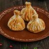 Жареные хинкали с курицей и сулугуни в Аджика по цене 510