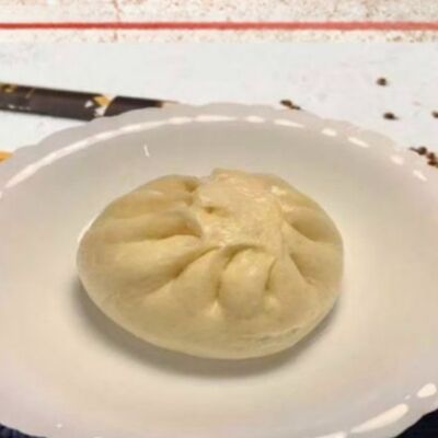 F2 Пирожок со свининой и пекинской капустой в Ван шифу по цене 158 ₽