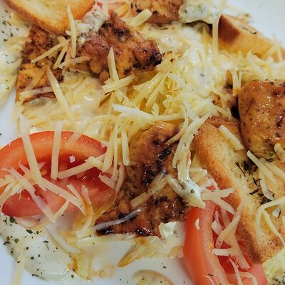 Салат Цезарь в Паста и пицца PROSTO по цене 499 ₽