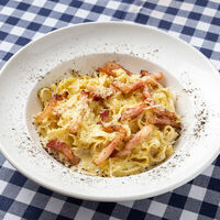 Паста Карбонара по-деревенски в Trattoria Caffe Del Sole