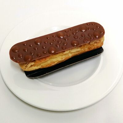 Эклер Маракуйя в Bon Bon по цене 260 ₽