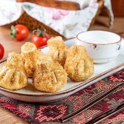 Мини-хинкали с сыром, жаренные в панировке панко в Чито-Грито по цене 610 ₽