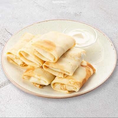 Большая порция блинчиков с мясом в Шоколадница по цене 1392 ₽