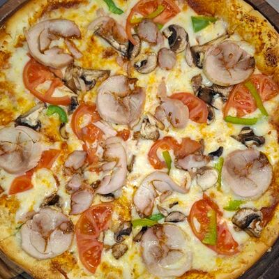 Пицца с курицей и грибами Средняя в Shafran по цене 140000 сум