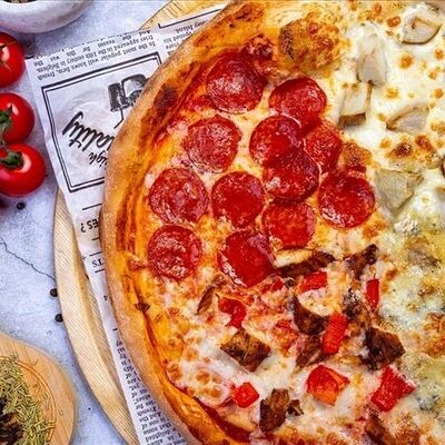 Пицца Четыре сезона650г в Donna Maria PREMIUM по цене 1460 ₽