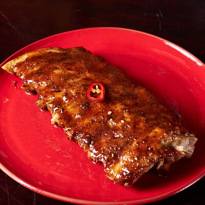 Свиные рёбра барбекю в Lions Head по цене 1190 ₽