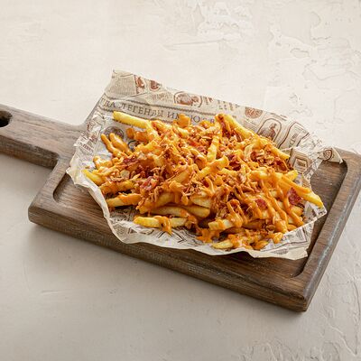 Бельгийский картофель фри с беконом и соусом Том Ям в Brasserie Kriek по цене 690 ₽