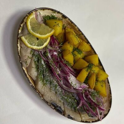 Селедка с печеным картофелем в Чили Gurman Сlub по цене 550 ₽