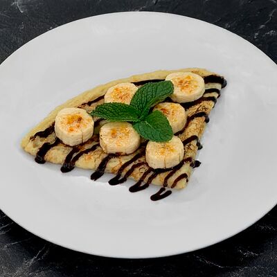 Блин с бананом и шоколадом в Brauny по цене 260 ₽