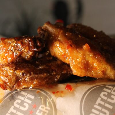 Куриные крылья в Butch Burger по цене 540 ₽
