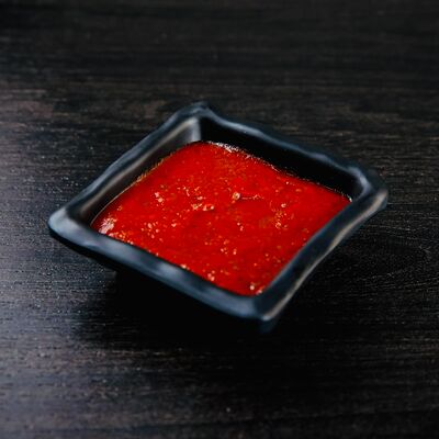 Шрирача-соус (очень острый) в Loca Pizza по цене 65 ₽