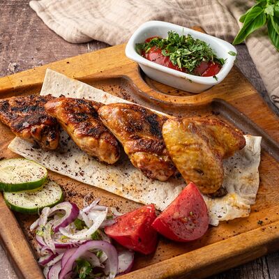 Шашлык из куриных крыльев в Шашлык Центр на Углях по цене 499 ₽