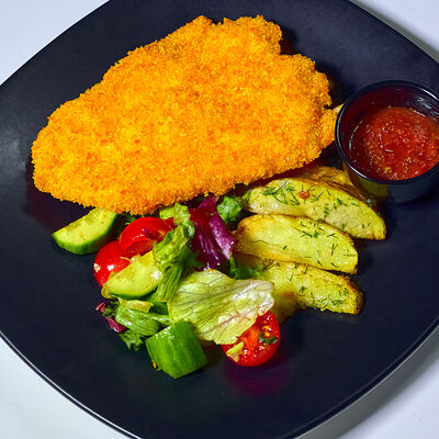 Шницель из курицы в Кафе Наше Место по цене 540 ₽