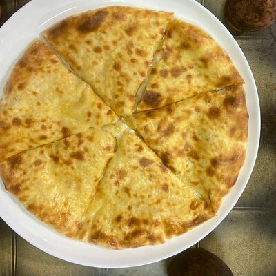 Хачапури по-мингрельски в Мацони по цене 785 ₽
