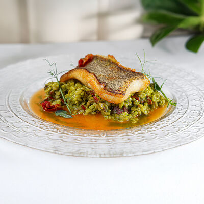 Палтус с зеленым булгуром и пряным соусом в Юность у моря по цене 1450 ₽