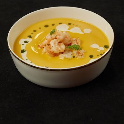 Тыквенный суп с креветкамив Duran по цене 690 ₽