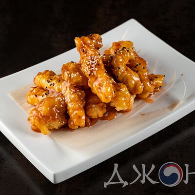 Куриные стрипсы в кисло-сладком соусе в Джонга по цене 560 ₽