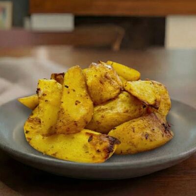 Картофельные дольки запеченные в Кулинария Камин по цене 166 ₽