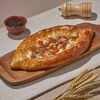 Хачапури лодочка с курочкой и ореховым соусом в Dostaевский по цене 631