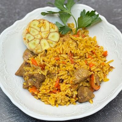 Плов с индейкой в Кулинария Ласка Гурмэ по цене 450 ₽
