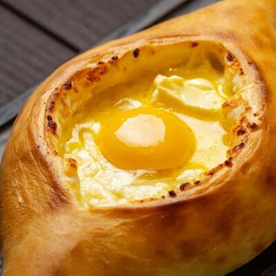 Хачапури по-аджарски в Утомленные солнцем по цене 590 ₽