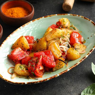 Картофель жареный с томатами в Добрый Грузин по цене 250 ₽