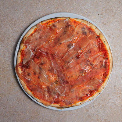 Пицца с пармской ветчиной в Bocconcino по цене 1630 ₽