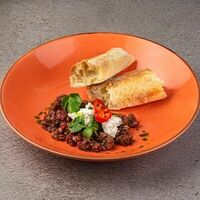 Тартар из говядины с домашней чиабаттойв Бар с едой Пороселло