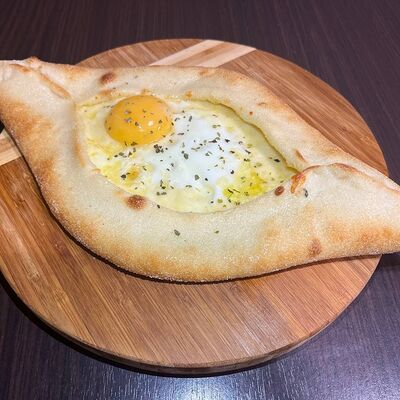 Хачапури по-аджарски в Халяль фуд пиццерия по цене 364 ₽
