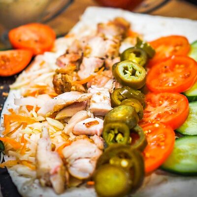 Шаверма острая с курицей в Shawerma place по цене 390 ₽