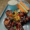 Куриные крылья в соусе BBQ в Vanana cafe по цене 620
