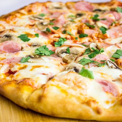 Пицца Ветчина-грибы в SushiShark по цене 795 ₽